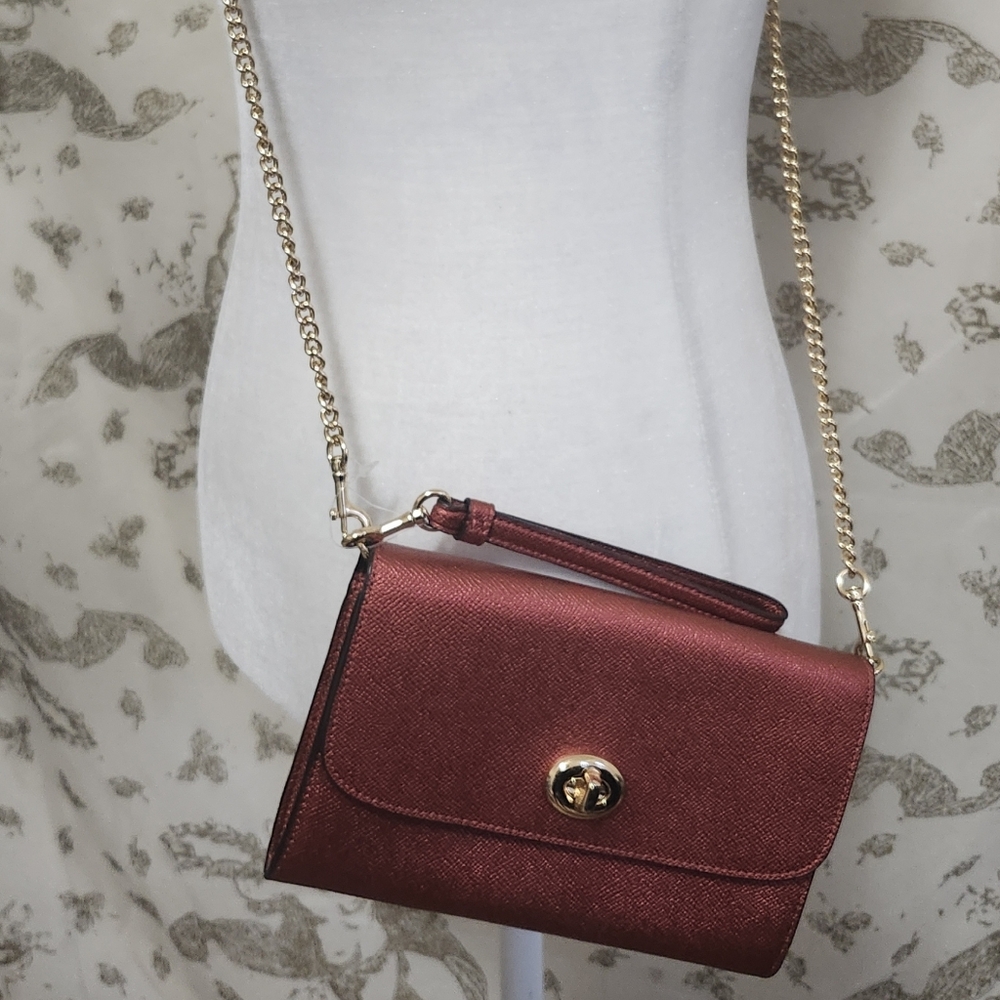 Red and gold coach clutch chain crossbody